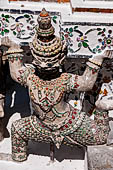 Bangkok Wat Arun - Statue of the mythical  demon bears  that support the different levels of the prang. 